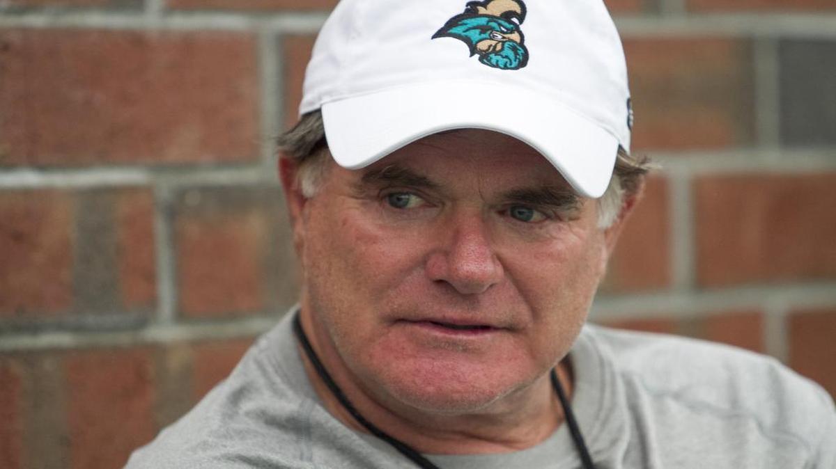 Coastal Carolina head coach Joe Moglia watches his team practice on Tuesday.