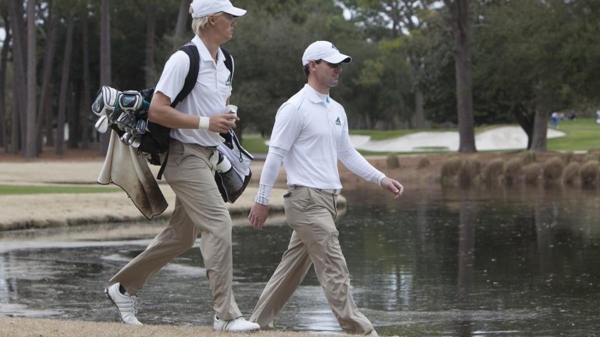 Kevin McPherson (right) was the Coastal Carolina head men’s golf coach from 2013-2016.