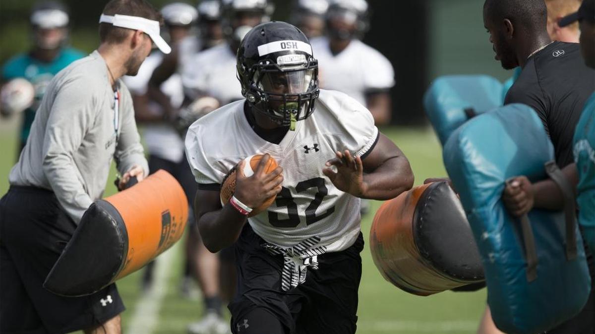 Senior running back Osharmar Abercrombie (32) will be the starter this season with the departure of De’Angelo Henderson.