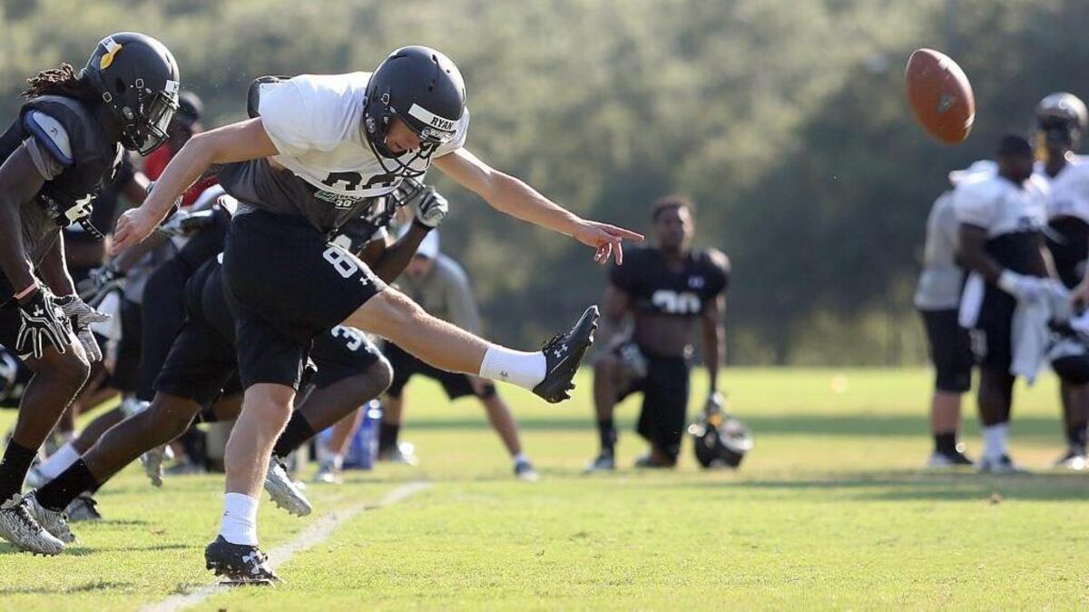 Ryan Granger kicks in practice at Coastal Carolina University on Tuesday.