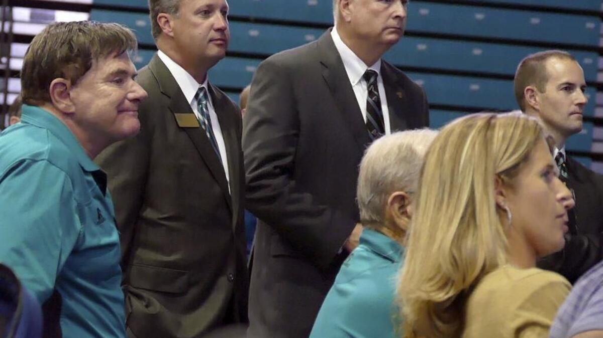 
Coastal Carolina football coach Joe Moglia listens during Tuesday’s press conference to announce the university will join the Sun Belt Conference.
