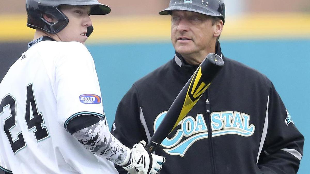 
Coastal Carolina's Dalton Ewing talks with coach Gary Gilmore.
