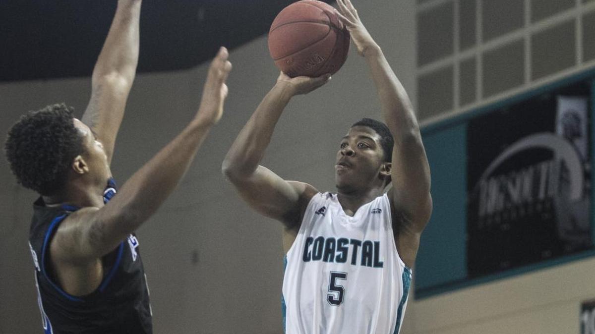 Coastal's Jaylen Shaw hits an outside jump shot during an earlier game against Presbyterian College.