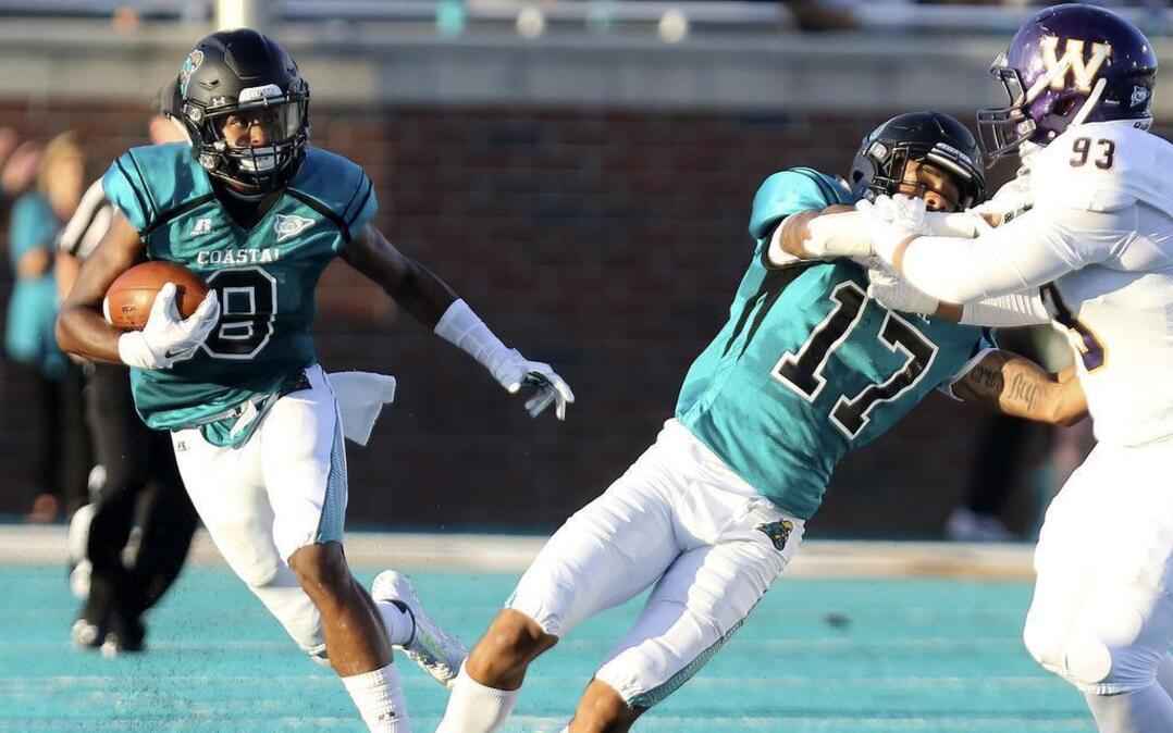 
Coastal Carolina’s Chris Jones returns a punt during Saturday’s game against Western Illinois.
