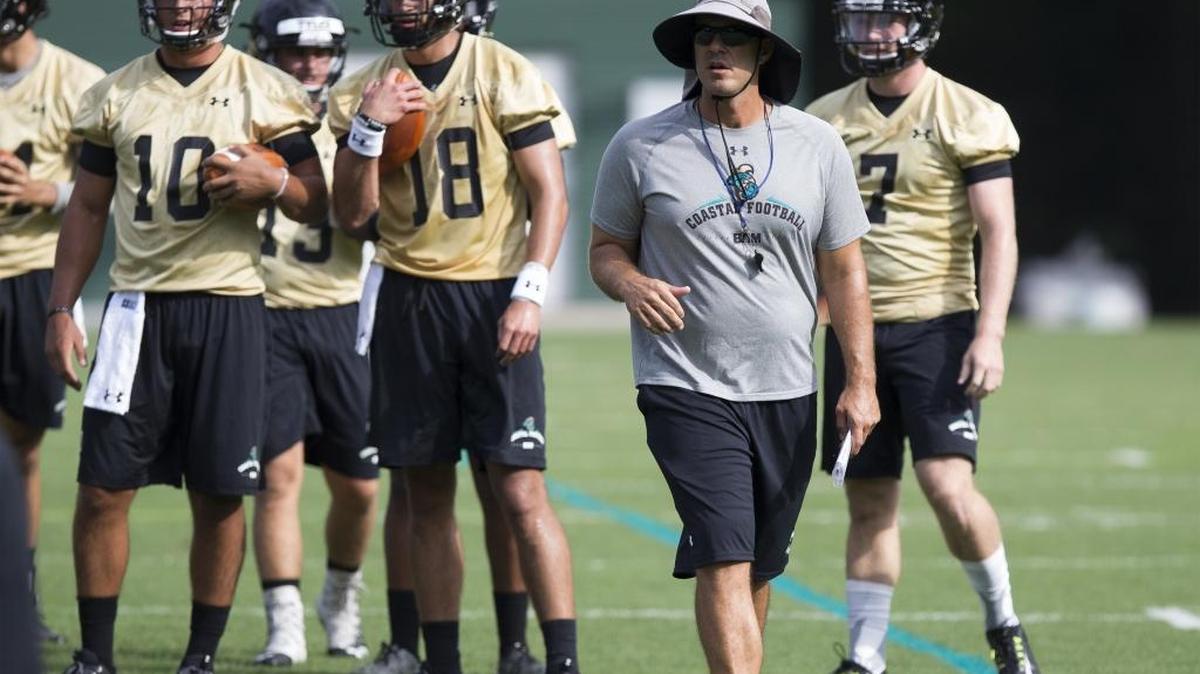 Interim head coach Jamie Chadwell leads Coastal Carolina into its first FBS game Saturday against UMass.
