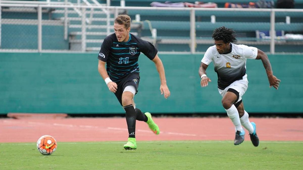 Coastal Carolina’s Colin Marz (left) dribbles past Virginia Commonwealth’s Brandon Eaton earlier this year.
