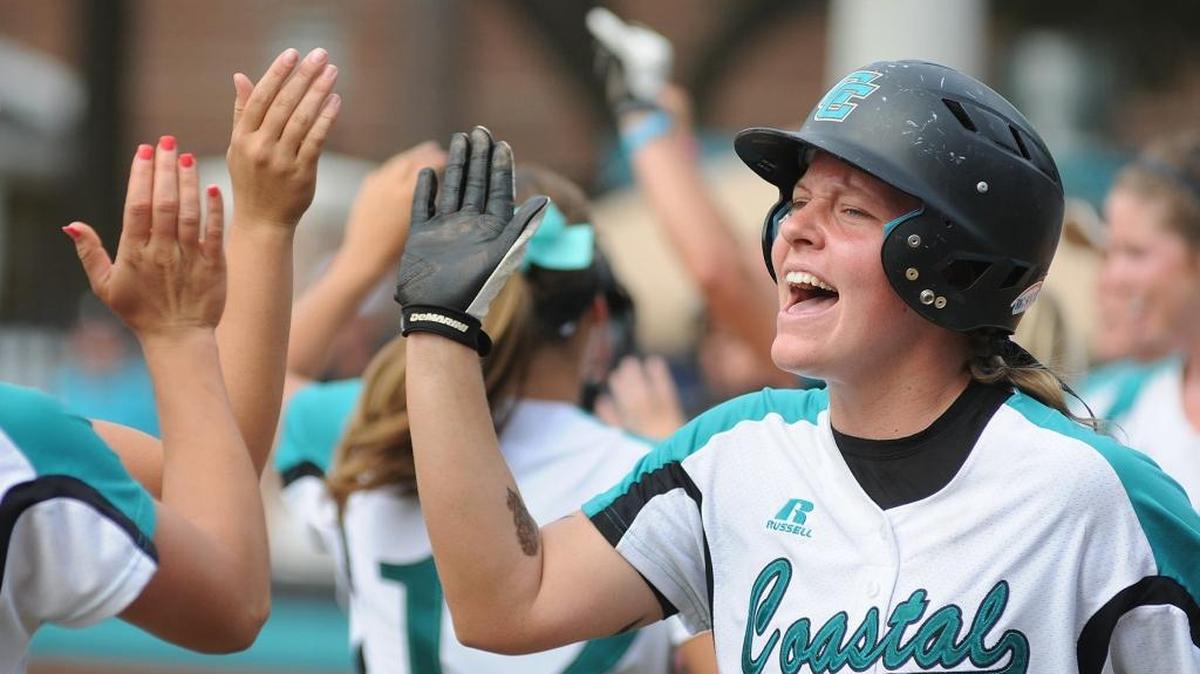 Coastal Carolina’s Morgan Noad, who was a senior last season, celebrates a run with her teammates.