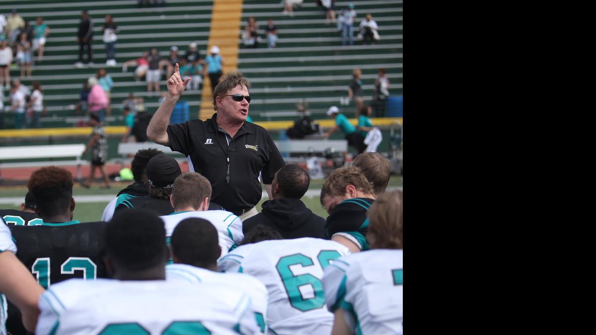 
CCU coach Joe Moglia speaks to his team following the annual spring game. 
