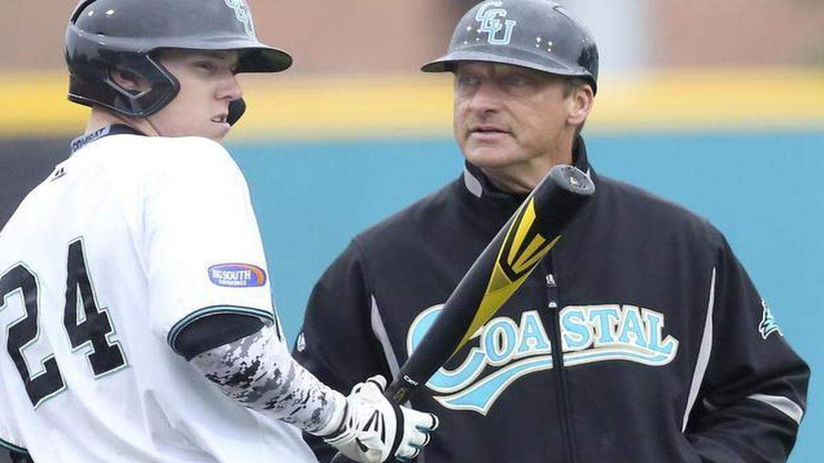 
CCU coach Gary Gilmore (left).

