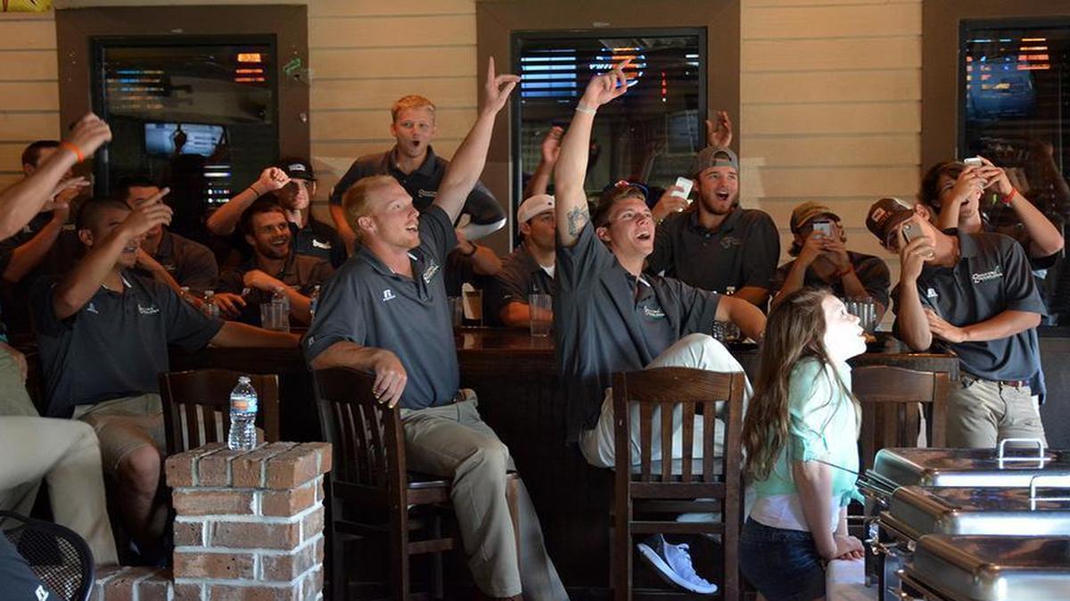 
Members of Coastal Carolina University’s baseball team react to the NCAA Regionals selections on Monday, May 25, 2015.
