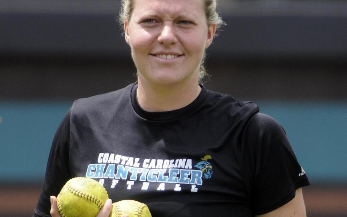 Coastal Carolina catcher Morgan Noad picks up balls during batting practice ahead of last year’s Big South tournament.