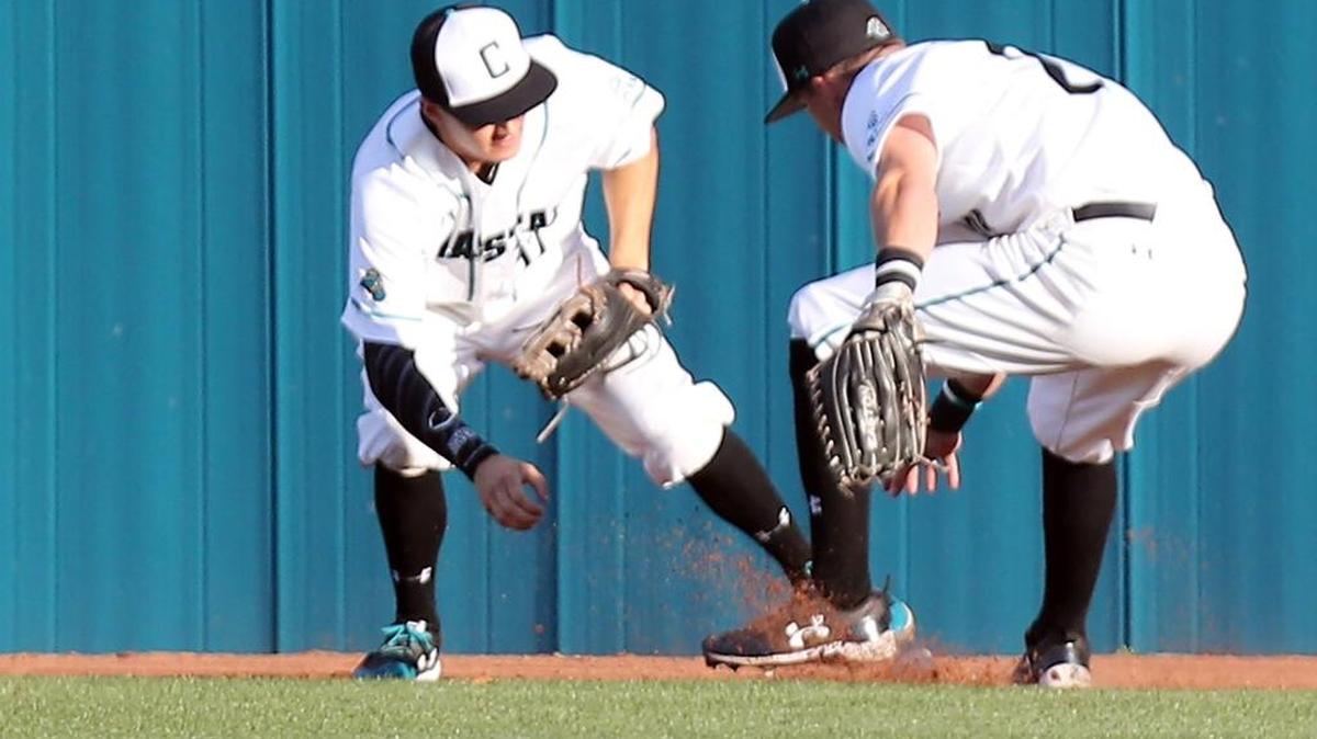 Coastal Carolina’s Dalton Ewing (right) drove in five runs Sunday.