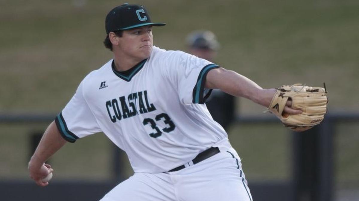 Coastal Carolina’s Tyler Poole prepares to deliver toward home plate during a recent game.
