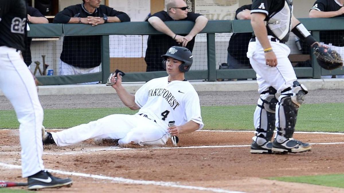 Wake Forest’s Stuart Fairchild (center) drove in seven runs against Coastal Carolina on Tuesday.
