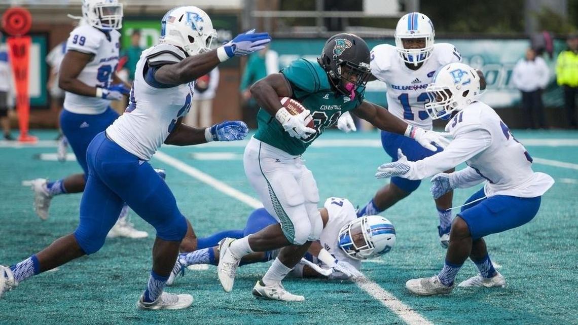 Though drawing ever closer to setting an FCS record for touchdowns in consecutive games, Coastal Carolina running back De’Angelo Henderson has been all business heading into the Chants matdchup with Monmouth.