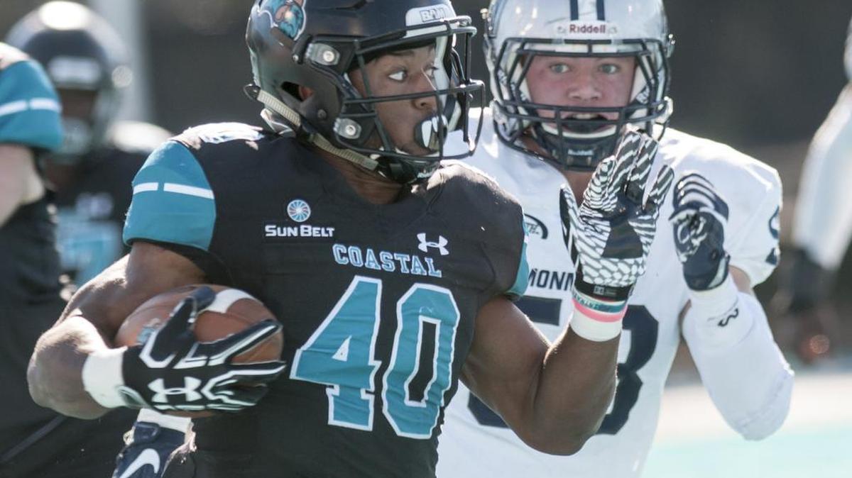 Coastal Carolina running back Kenneth Daniels finds room to run during last Saturday’s game with Monmouth.