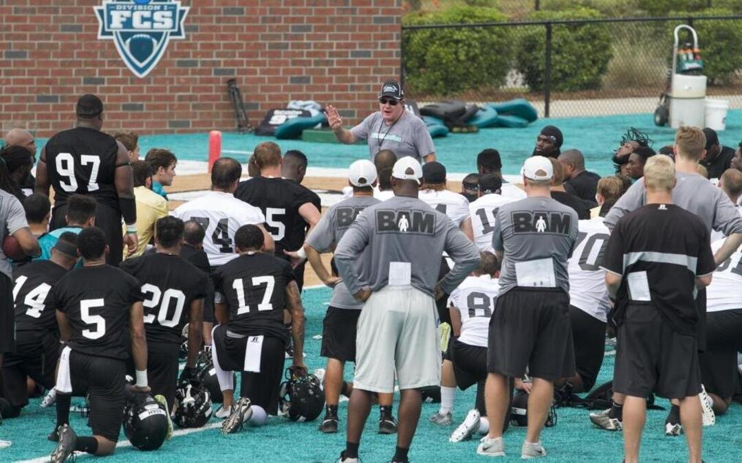 
Coastal Carolina coach Joe Moglia talks to his players during a recent practice.
