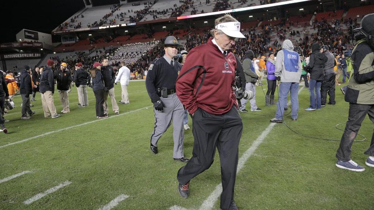 
South Carolina head coach Steve Spurrier walks off the field after a loss to Tennessee in 2014. Spurrier is retiring as the Gamecocks’ all-time winningest coach.
