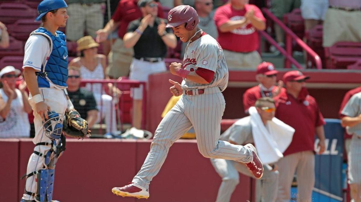 South Carolina’s Dom Thompson-Williams scores the go-ahead run in the ninth inning on a Hunter Taylor hit against Duke on Saturday at Founders Park in the Columbia Regional.