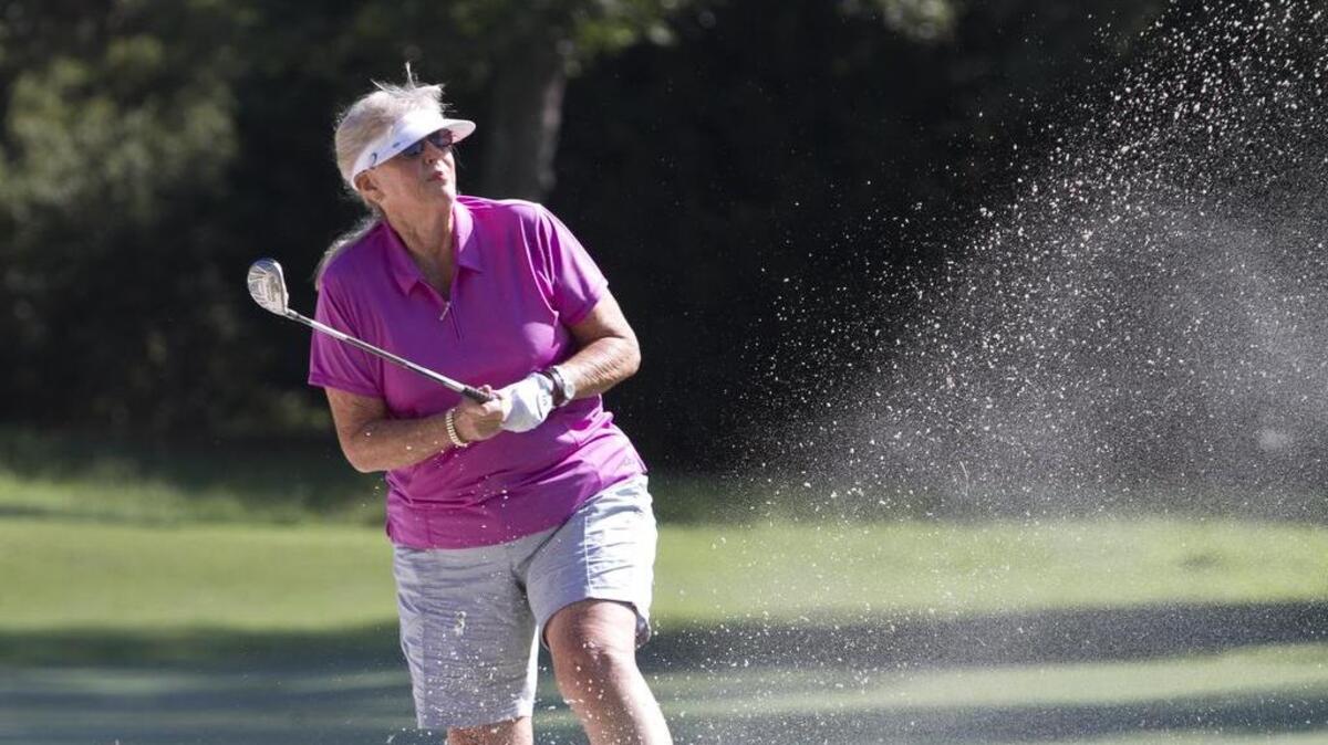 
Sandy Harvey of League City, Texas plays at Tidewater Golf Club on Tuesday in the second round of the 32nd Myrtle Beach World Amateur Handicap Championship. Harvey underwent a double mastectomy for breast cancer last year. “I just think nothing should stop you,” she said.
