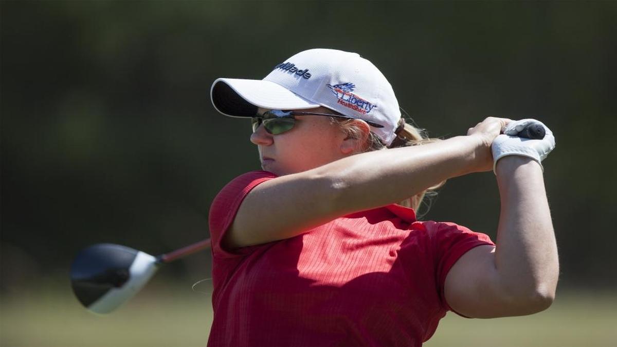 Austin Ernst watches her drive on the 16th tee of Barefoot Resort’s Dye Club during the Hootie & the Blowfish Monday after the Masters Celebrity Pro-Am in April.