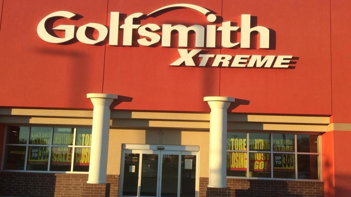 Signs announce the pending closing of the Golfsmith Xtreme retail store in Myrtle Beach.