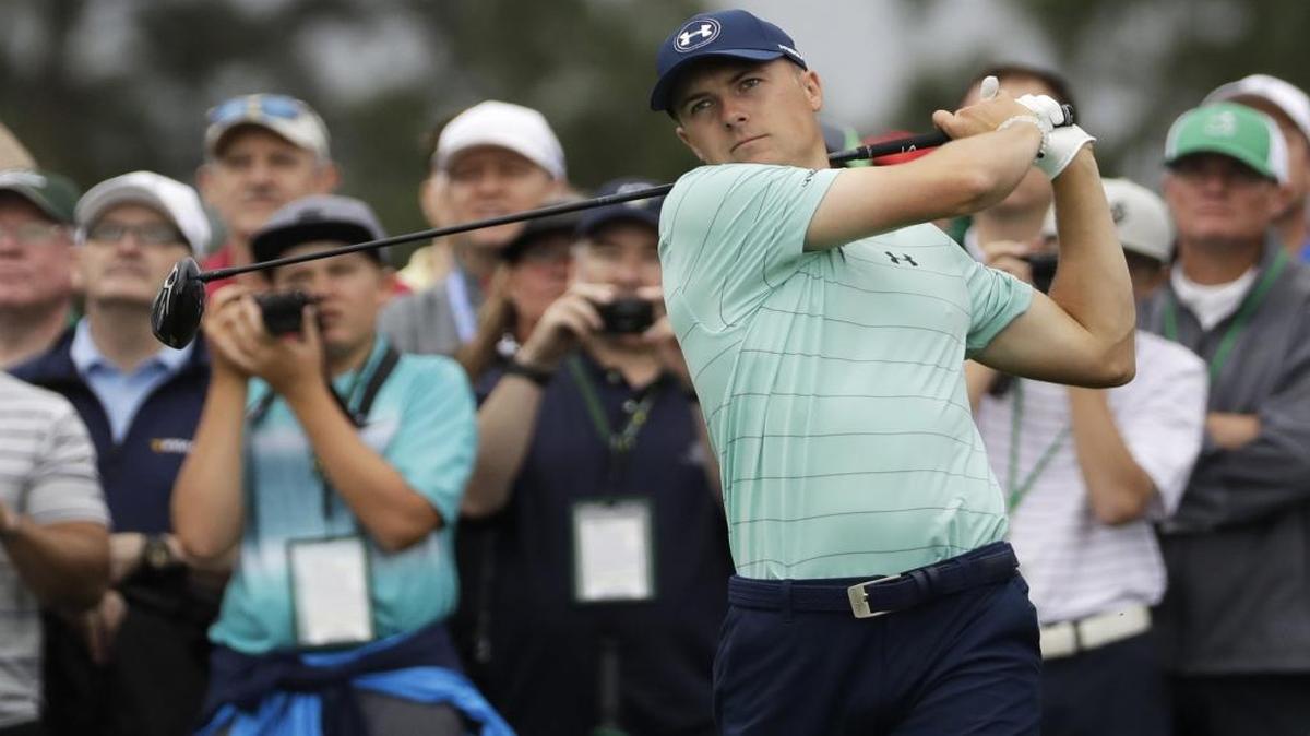 Jordan Spieth hits a drive on the eighth tee during a practice round for the Masters Tournament on Wednesday.