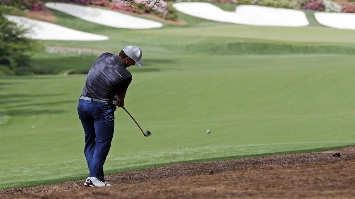 Jordan Spieth hits on the 13th hole during Wednesday’s par-three competition at the Masters golf tournament Wednesday, April 6, 2016, in Augusta, Ga.