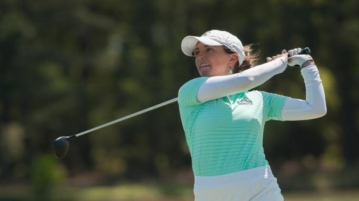 Coastal Carolina's Lena Schaeffner hits a drive on the final hole of the Big South Conference tournament earlier this month at DeBordieu Club. The senior’s career at CCU has come to an end.
