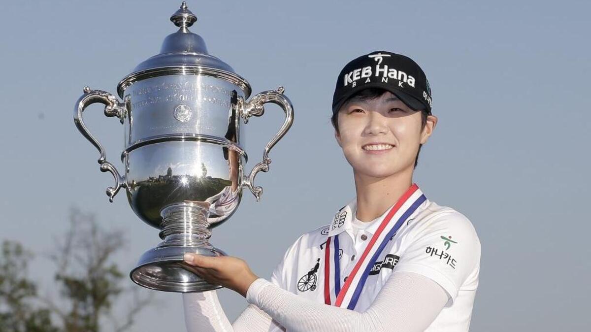 South Korea's Sung Hyun Park holds up the championship trophy after winning the 2017 U.S. Women's Open in July at Trump National Golf Club in Bedminster, N.J.