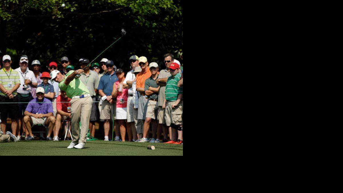 
Amateur Antonio Murdaca, 19, of Australia, tees off on the seventh hole during the first round of the Masters. Murdaca won the 2014 Latin America Amateur Championship to earn entry into this week’s event at Augusta National Golf Club.


