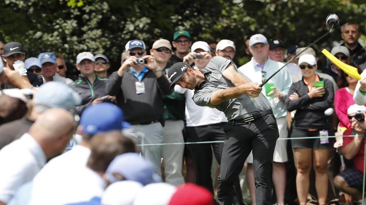 Dustin Johnson tees on the seventh hole during a practice round for the Masters golf tournament on Wednesday.