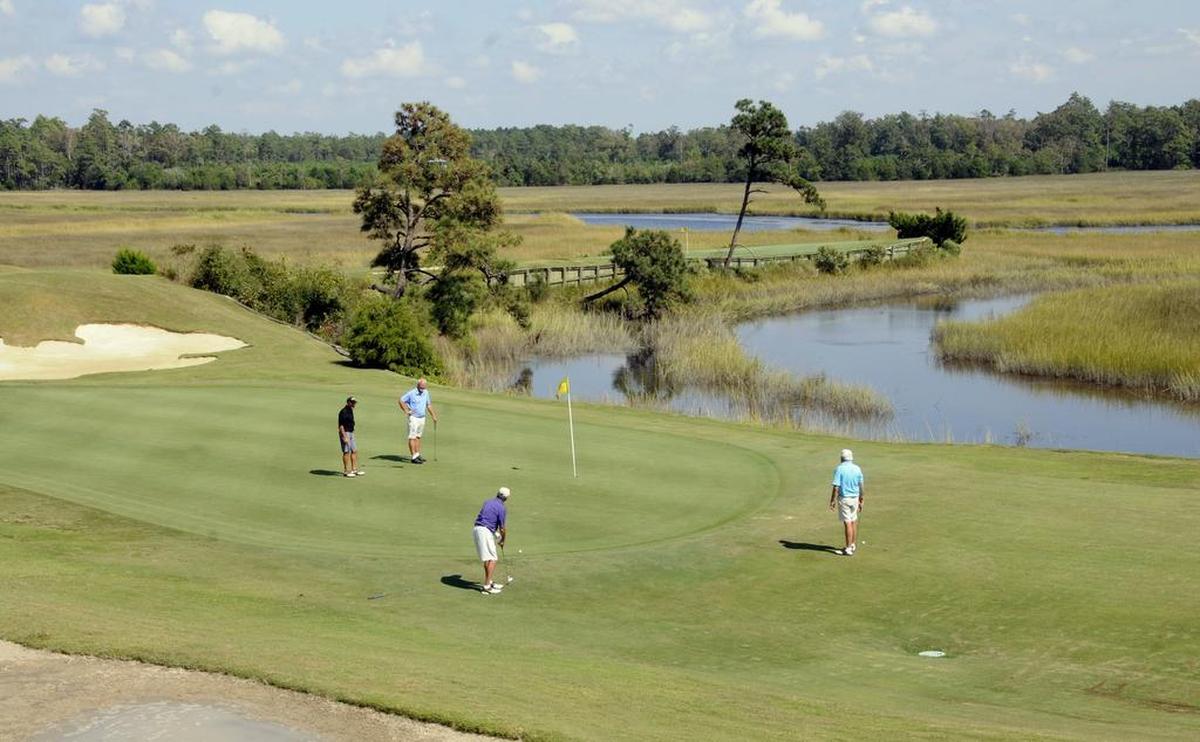 The green on the par-4 18th hole at Rivers Edge Golf Club.