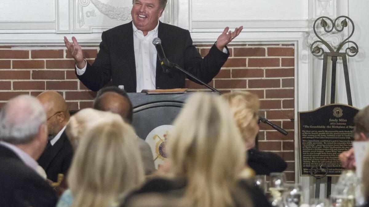 
Sandy Miles, a former Pine Lakes Country Club owner, was inducted into the Myrtle Beach Golf Hall of Fame posthumously tonight with his son, Scott, telling stories.
