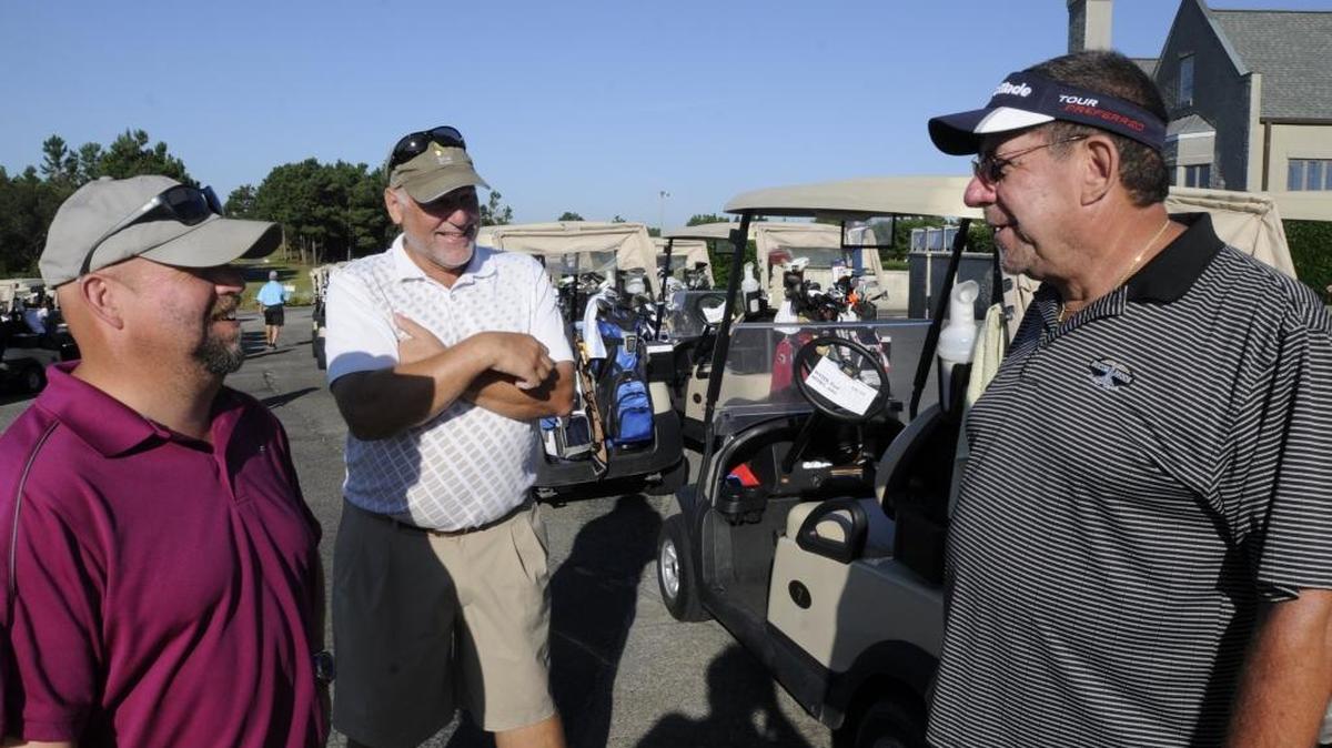 Dennis Navin (right), Greg Davis (left) and Paul Mayer (center) chat at Legends Resort before a round in the Myrtle Beach World Amateur Handicap Championship, one of several tournaments operated by Myrtle Beach Golf Holiday.
