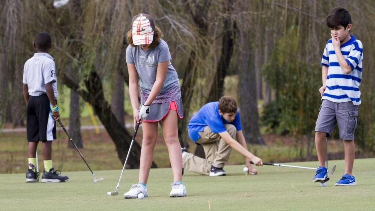 Area youth take part in a First Tee of the Grand Strand event at Eagle Nest Golf Club.