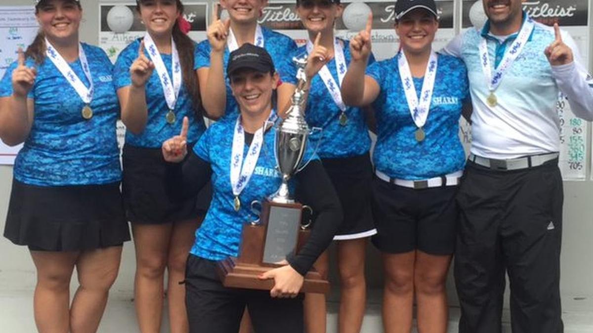 Members of the St. James girls golf team celebrate after claiming the Class AAA state title.