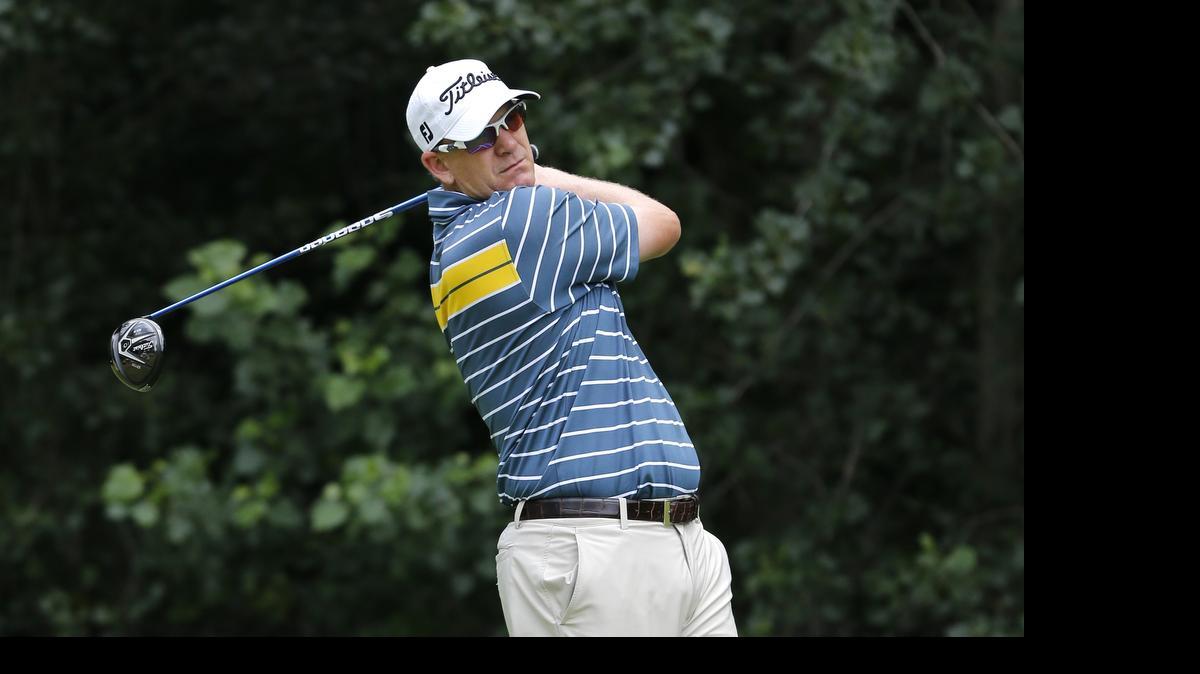 
Tom Gillis watches his tee shot on the second hole during the final round of the John Deere Classic.
