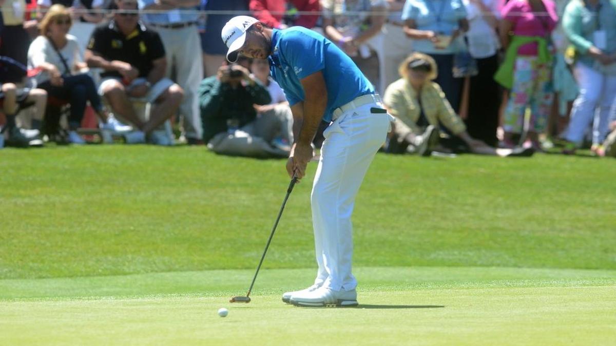 Jason Day putts on the green of the first hole during the third round of the RBC Heritage.