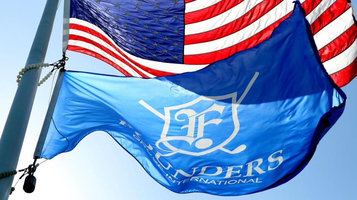 The Founders Group International flag flies along with the U.S. flag at Pine Lakes Country Club in Myrtle Beach on Wednesday, July 12, 2017.