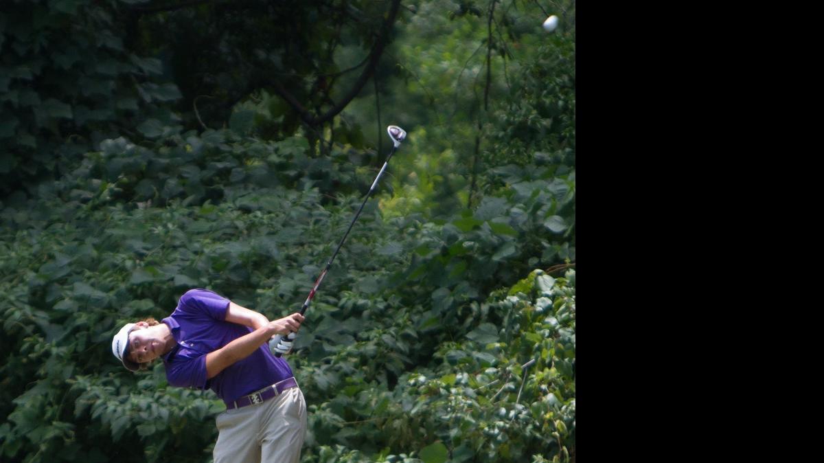 
Individual boys winner Blake Taylor of Atkinson, N.C., tees off on the sixth hole Sunday.
