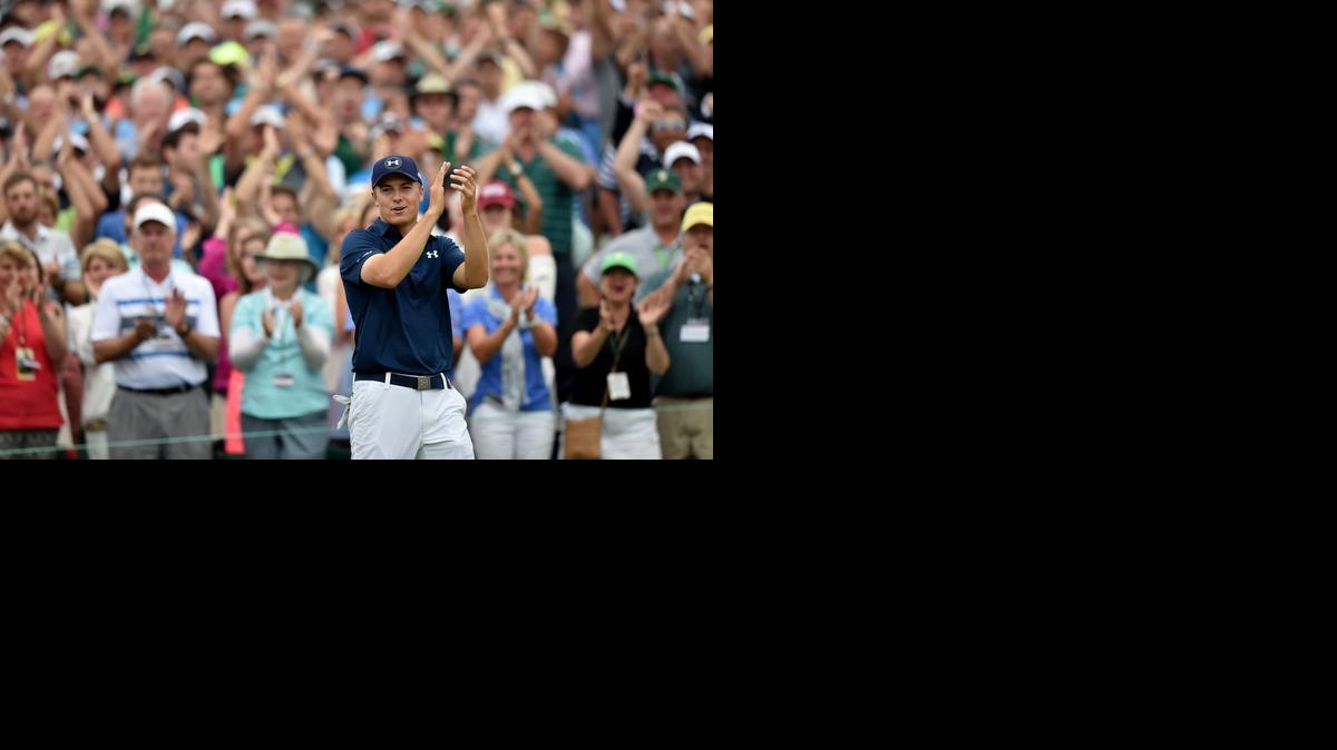 
Jordan Spieth celebrates after winning the 2015 Masters at Augusta National on Sunday.
