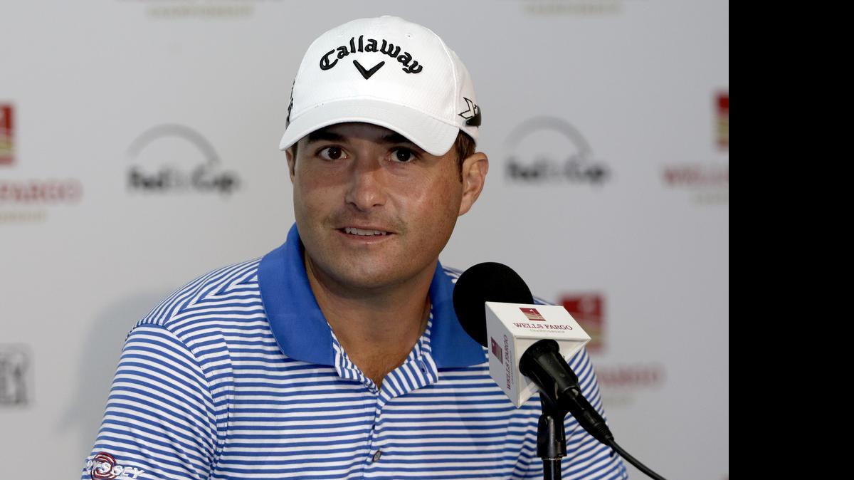 
Kevin Kisner answers a question during a news conference for the Wells Fargo Championship golf tournament at the Quail Hollow Club in Charlotte, N.C.
