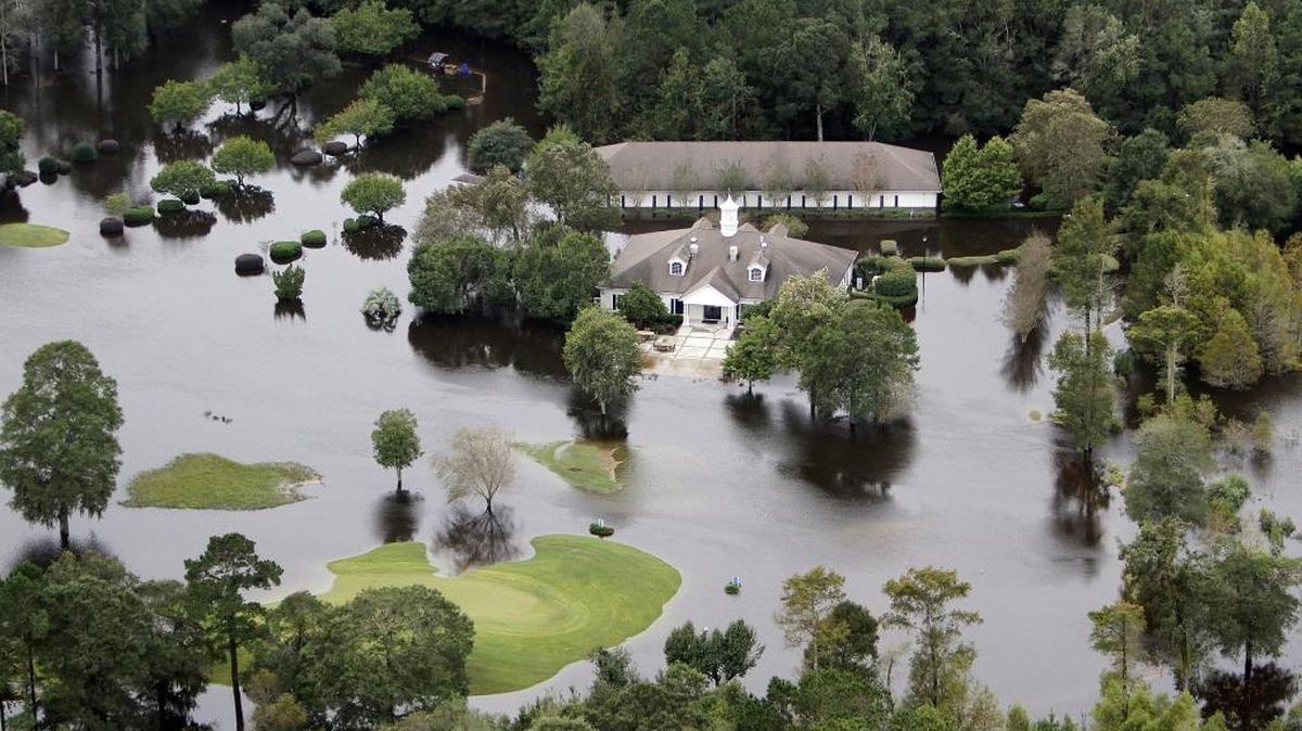 Aberdeen Country Club is flooded along the Waccamaw River on Oct. 6, 2015, following four days of record rains. The course flooded again last fall after Hurricane Matthew passed through the area.