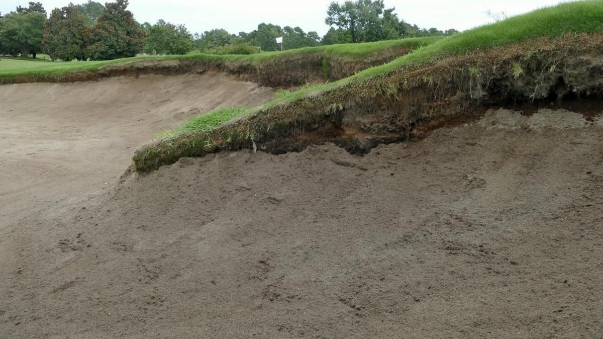 The short par-4 ninth hole on the Parkland Course at Legends Golf Resort has an elevated green high above a deep front bunker.