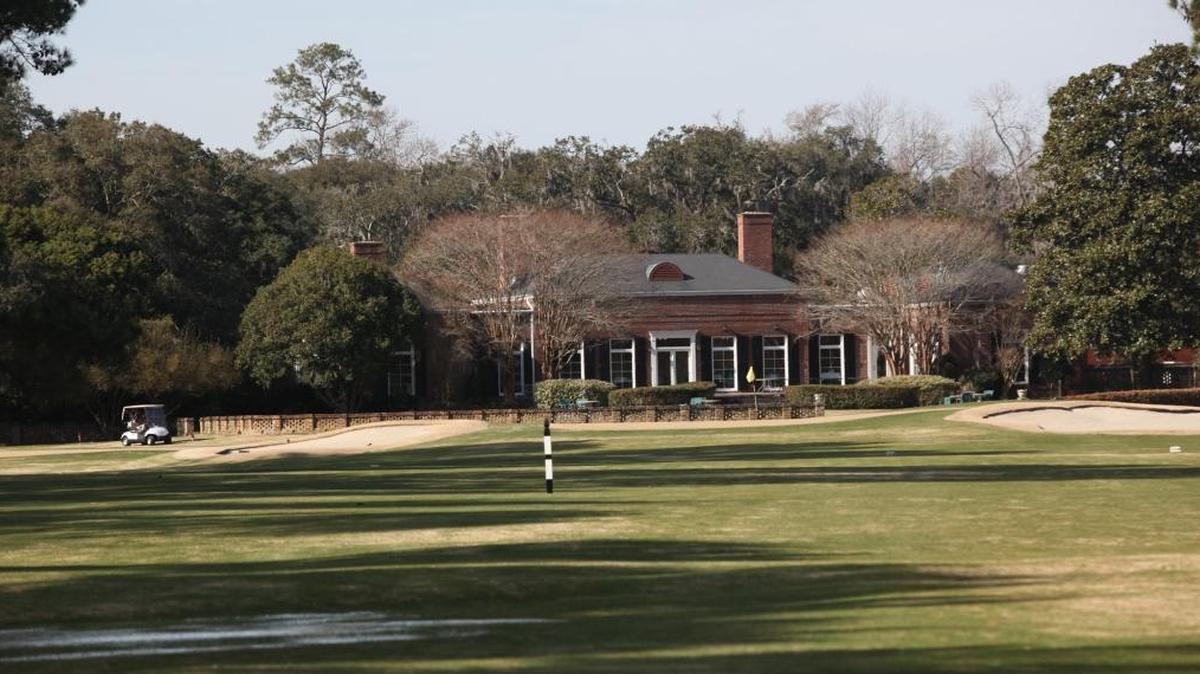 The 18th green sits in front of the brick plantation house at Wedgefield Plantation Country Club in Georgetown County.