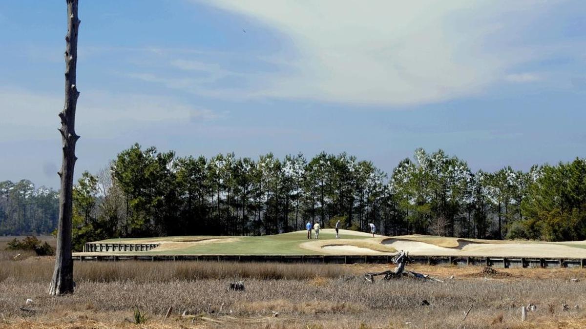 Carolina National Golf Club in Bolivia, N.C., has been added to the portfolio of Arnold Palmer Golf Management. Pictured is the par-3 fifth hole of the 27-hole club’s Heron Course.