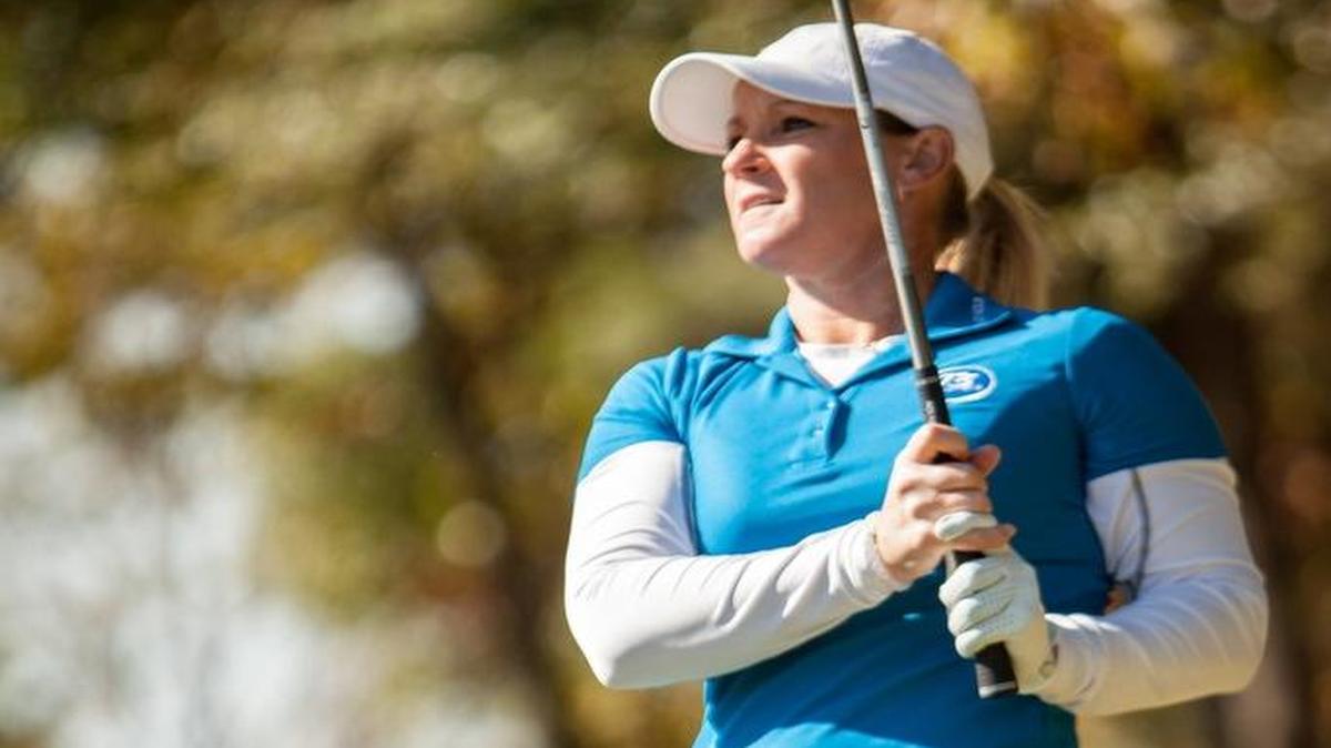 Kristy McPherson plays a round of golf at True Blue last month.
