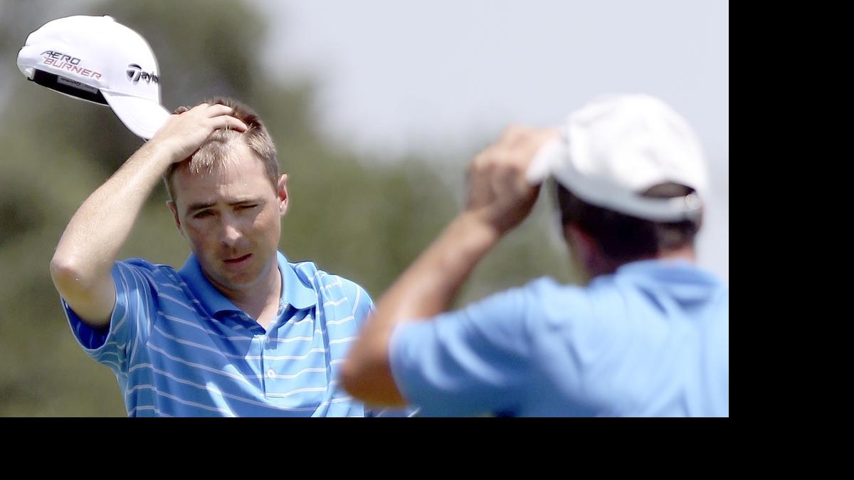 Mike Townsend (left) of Kiawah Island Club-Cassique wins the CPGA Professional Championship at the Grande Dunes on Thursday, July 30, 2015.
