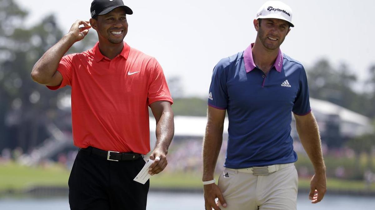Dustin Johnson (right) trails only Tiger Woods (left) among Americans for the most total weeks at No. 1 since the Official World Golf Ranking was introduced in 1986. Johnson's stretch of 64 weeks in the top spot came to an end this week.
